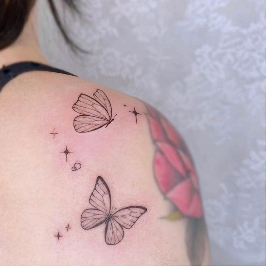 12+ Shoulder Butterfly Tattoo To Inspire You! 14 Black Butterflies Tattoo With An Additional Flower