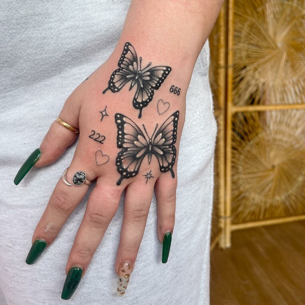 12+ Butterfly Tattoo On Hand For Girl That Will Blow Your Mind! 18 Black Butterfly Tattoo For Girls On Hands