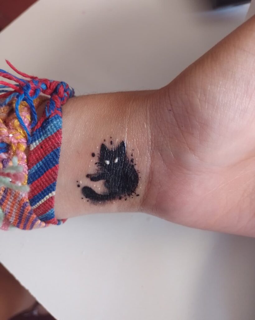 11+ Cat Finger Tattoo Ideas That Will Blow Your Mind 11 Black Cat Tattoo