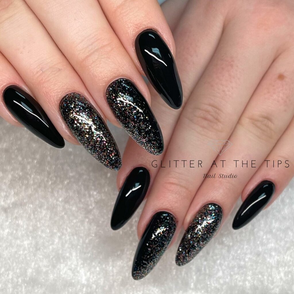 30 Latest Black Almond Nail Ideas To Try In 2024! 46 Sparkling Nights with Black Glitter Almond Nails