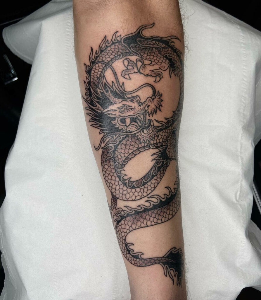 11+ Chinese Dragon Tattoo Arm Ideas That Will Blow Your Mind! 16 Black Ink Chinese Dragon Tattoo On Arm