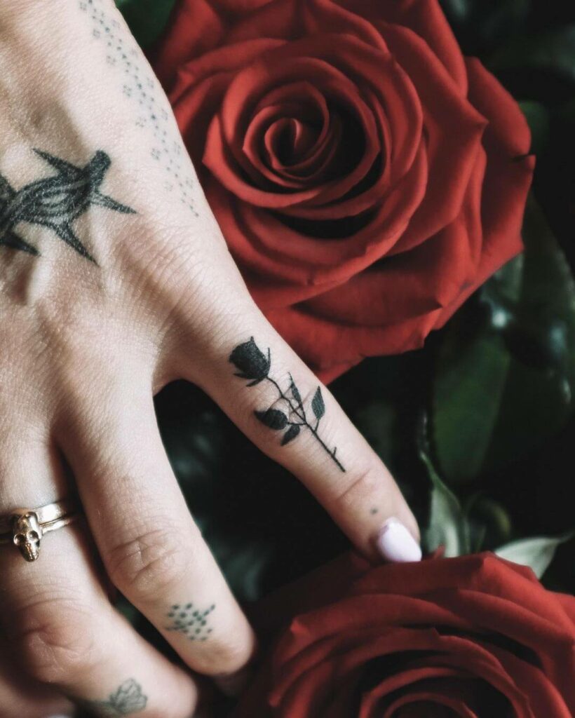 11+ Dainty Tattoo Ideas That Will Blow Your Mind! 11 Black Rose Dainty Finger Tattoos