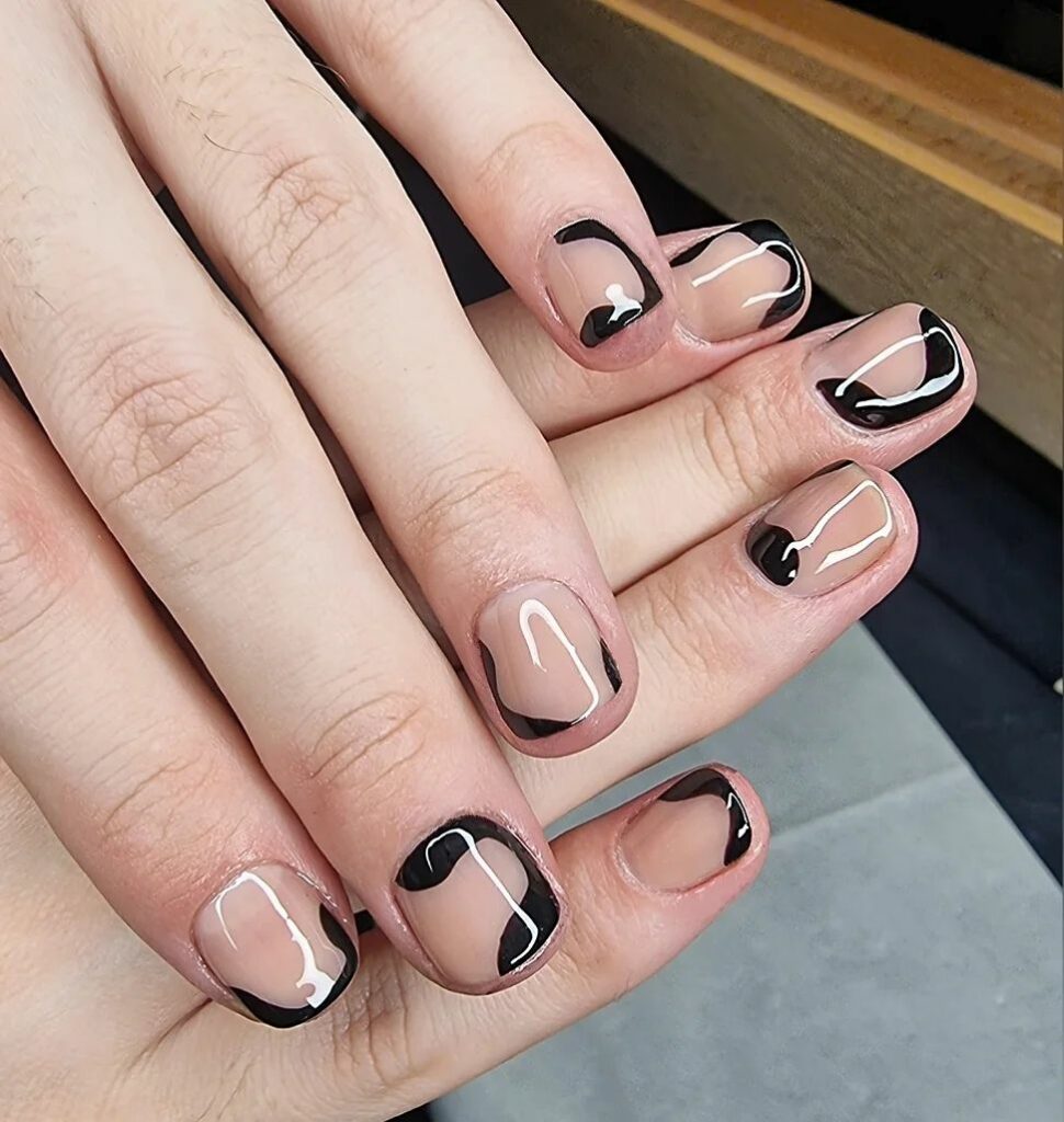 Get Creative with 39 Cute Short Nails Designs for 2024 18 Black White French + Reverse French Tips