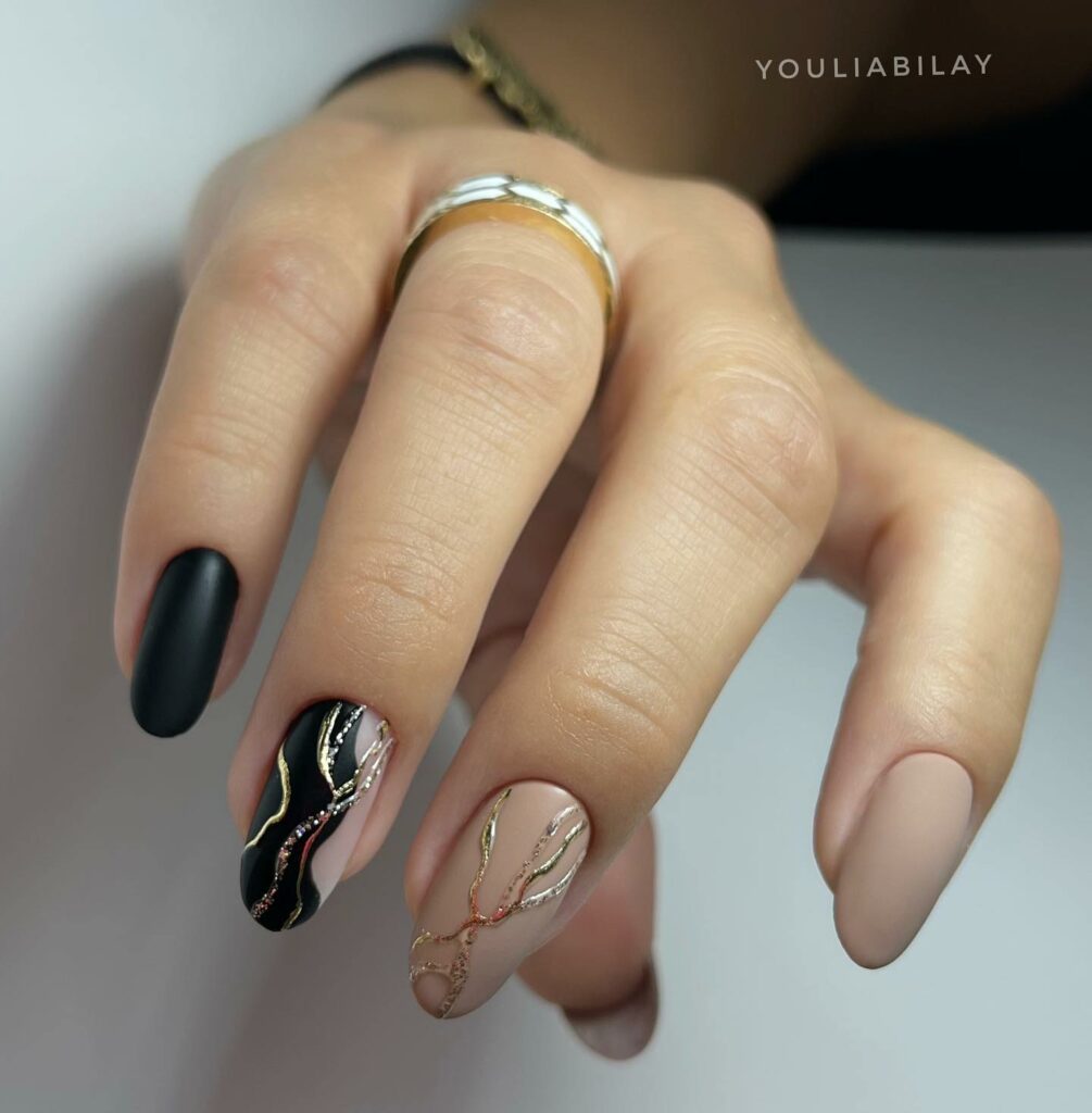 30 Latest Black Almond Nail Ideas To Try In 2024! 47 Black and Nude Nail Art with Metallic Accents