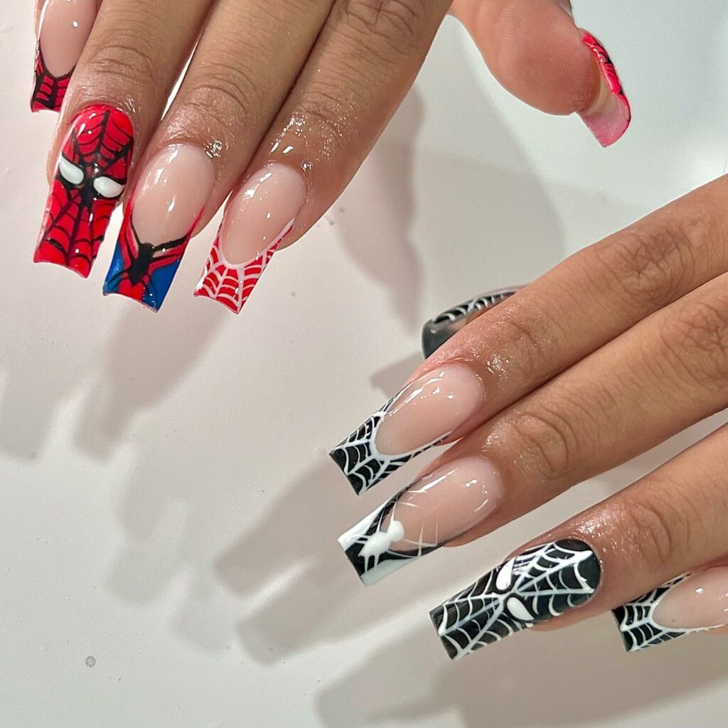 35 Amazing Spiderman Nail Designs To Try In 2024! 16 Black and Red Spiderman Nail Contrast