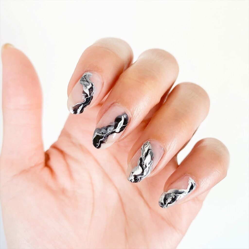 Indulge in 40 Marble Nail Designs for 2024 43 Black and White Contrast Marble nails