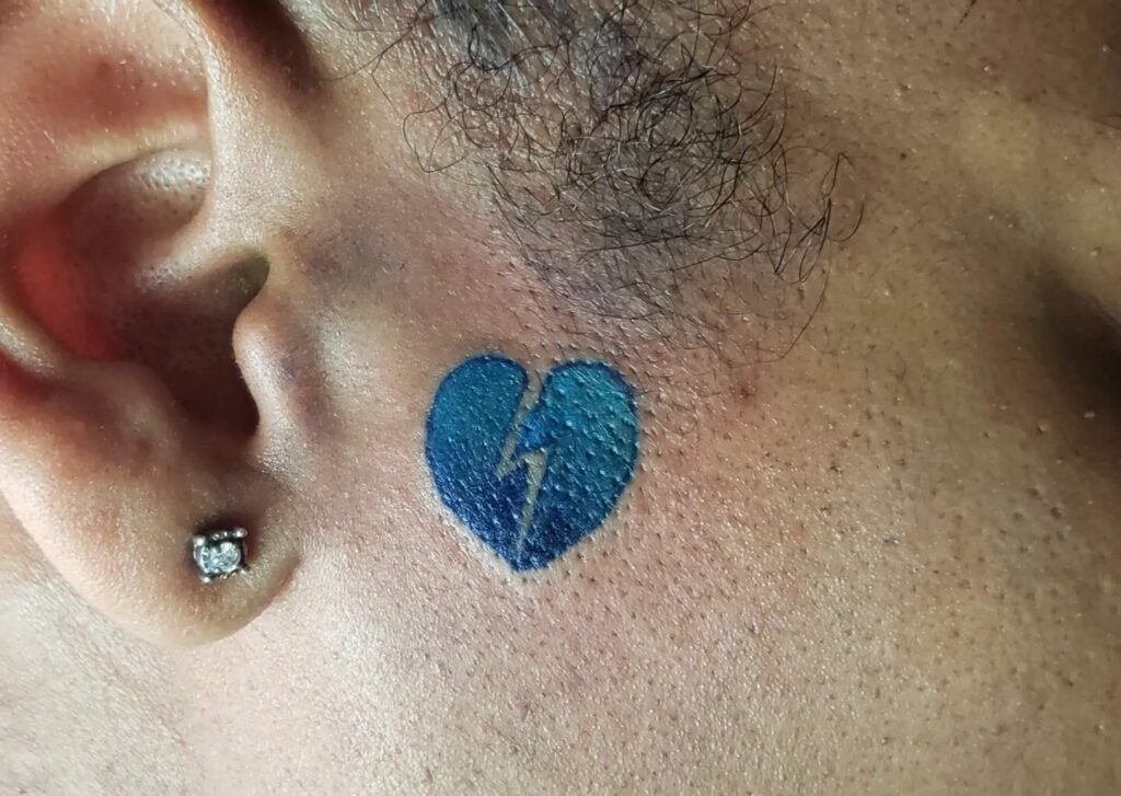 11+ Broken Heart Face Tattoo Ideas That Will Blow Your Mind! 15 Blue Broken Heart Tattoo
