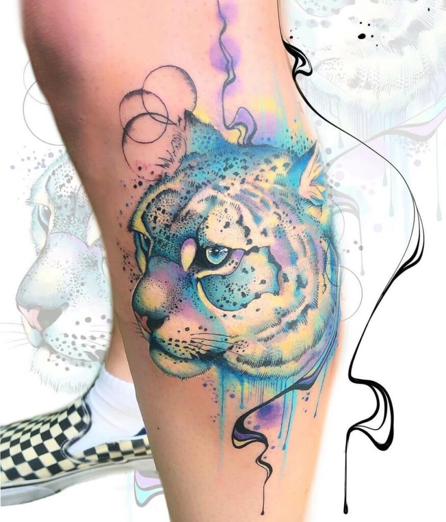 12+ Best Snow Leopard Tattoo Ideas To Inspire You! 13 Blue Colored Face Of Snow Leopard Tattoo