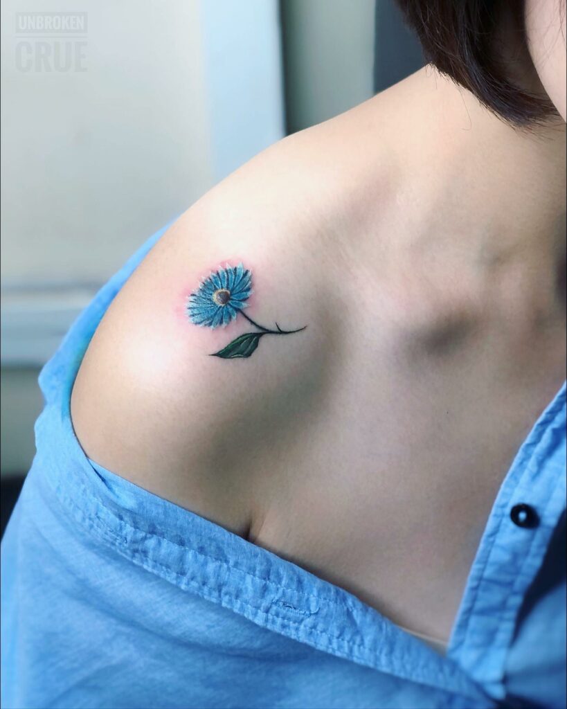 11+ Minimalist Daisy Tattoo Ideas That Will Blow Your Mind! 18 Blue Daisy Tattoo