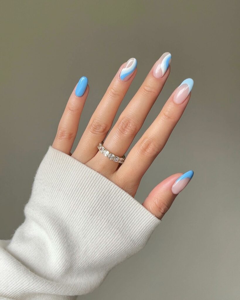 22 Latest Preppy Nail Ideas To Try In 2024! 11 Sophisticated Blue Swirls in Preppy Nails