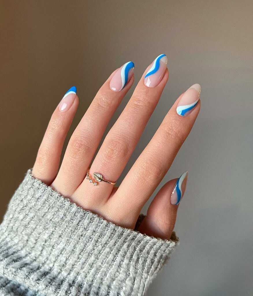 Get Creative with 39 Cute Short Nails Designs for 2024 15 Blue and White Swirl Nails