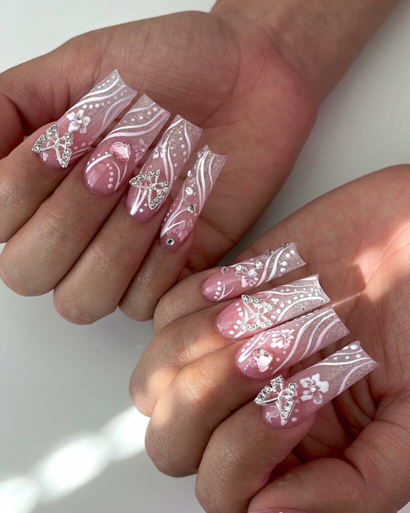 50 Latest Butterfly Nail Designs To try In 2024! 14 Blush Pink Butterfly Nails