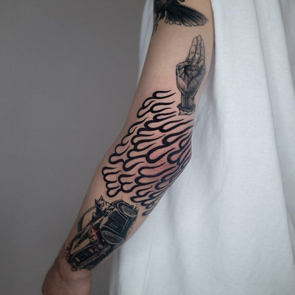 11+ Fire Tribal Tattoo Ideas That Will Blow Your Mind! 11 Bold Elbow Fire Tribal Tattoo