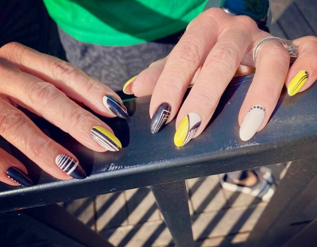 19 Latest Spring Nail Art Ideas To Try This Season 22 Bright Yellow Striped Nails
