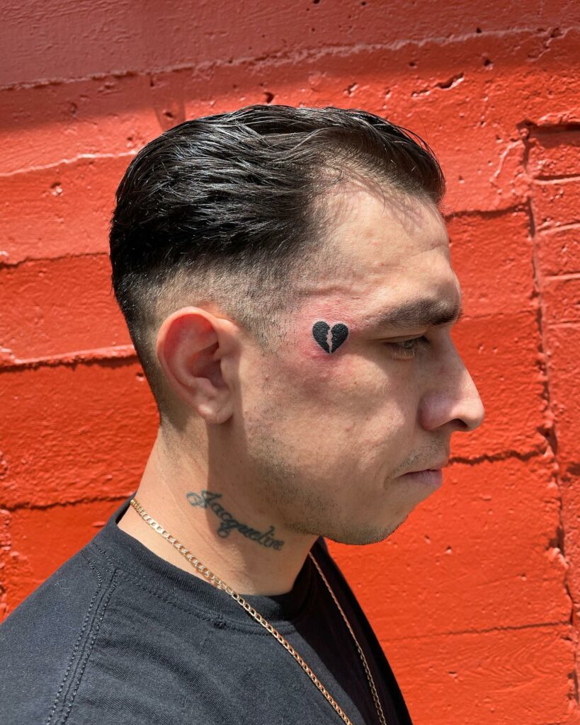 11+ Broken Heart Face Tattoo Ideas That Will Blow Your Mind! 12 Broken Heart Tattoo On Face