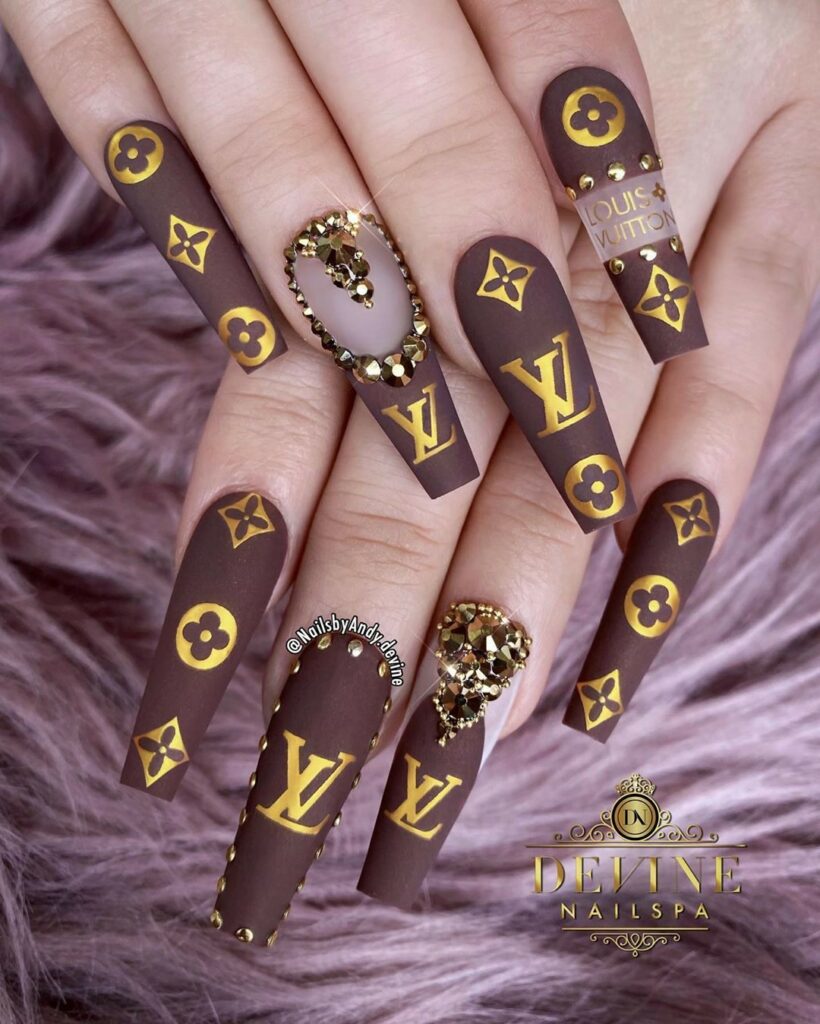 25 Latest Louis Vuitton Nails To Try In 2024 13 Earthy Brown Coffin Ombré Nails with Louis Vuitton
