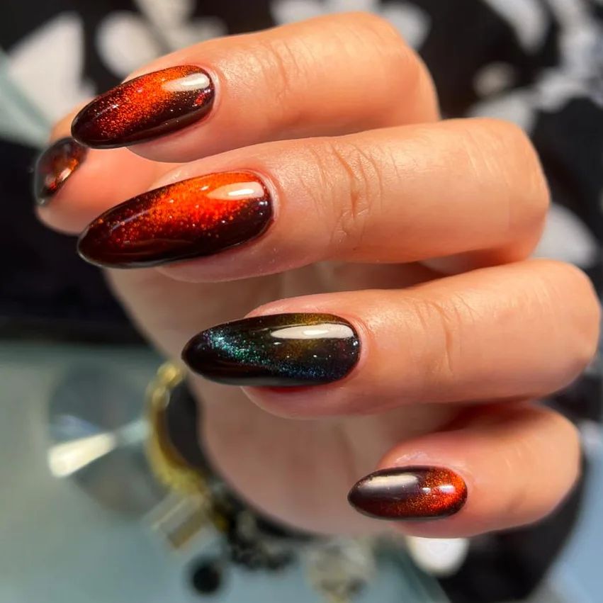 Captivating Cat-Eye Nail Designs to Try in 2024 π» 43 Brown and Teal cat eye nails
