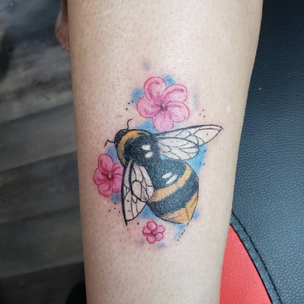 11+ Queen Bee Tattoo Ideas You Have To See To Believe! 14 Bumble Bee Tattoo featuring A Queen Bee Amidst Flowers