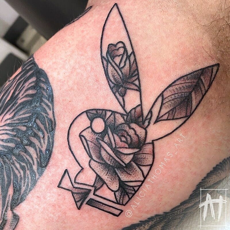 11+ Playboy Bunny Tattoo Ideas You Have To See To Believe! 14 Bunny With Roses Playboy Tattoo