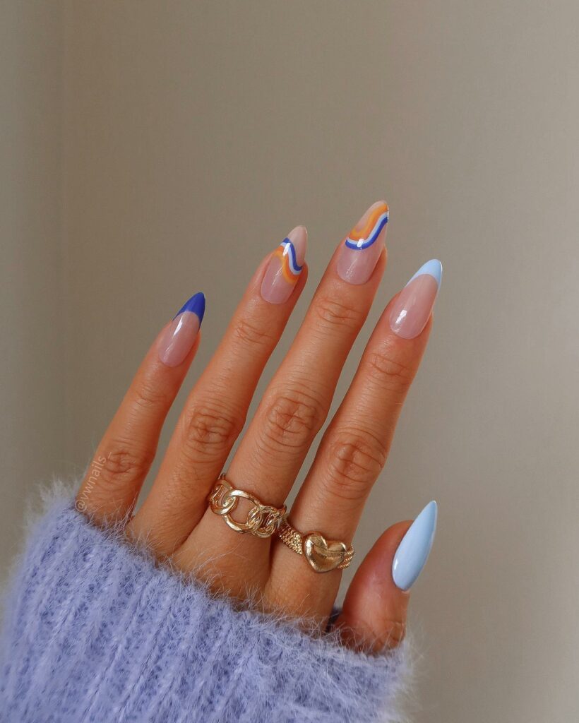 Stylish Burnt Orange Nail Trends of 2024 π 46 Burnt Orange with Metallic Stripes