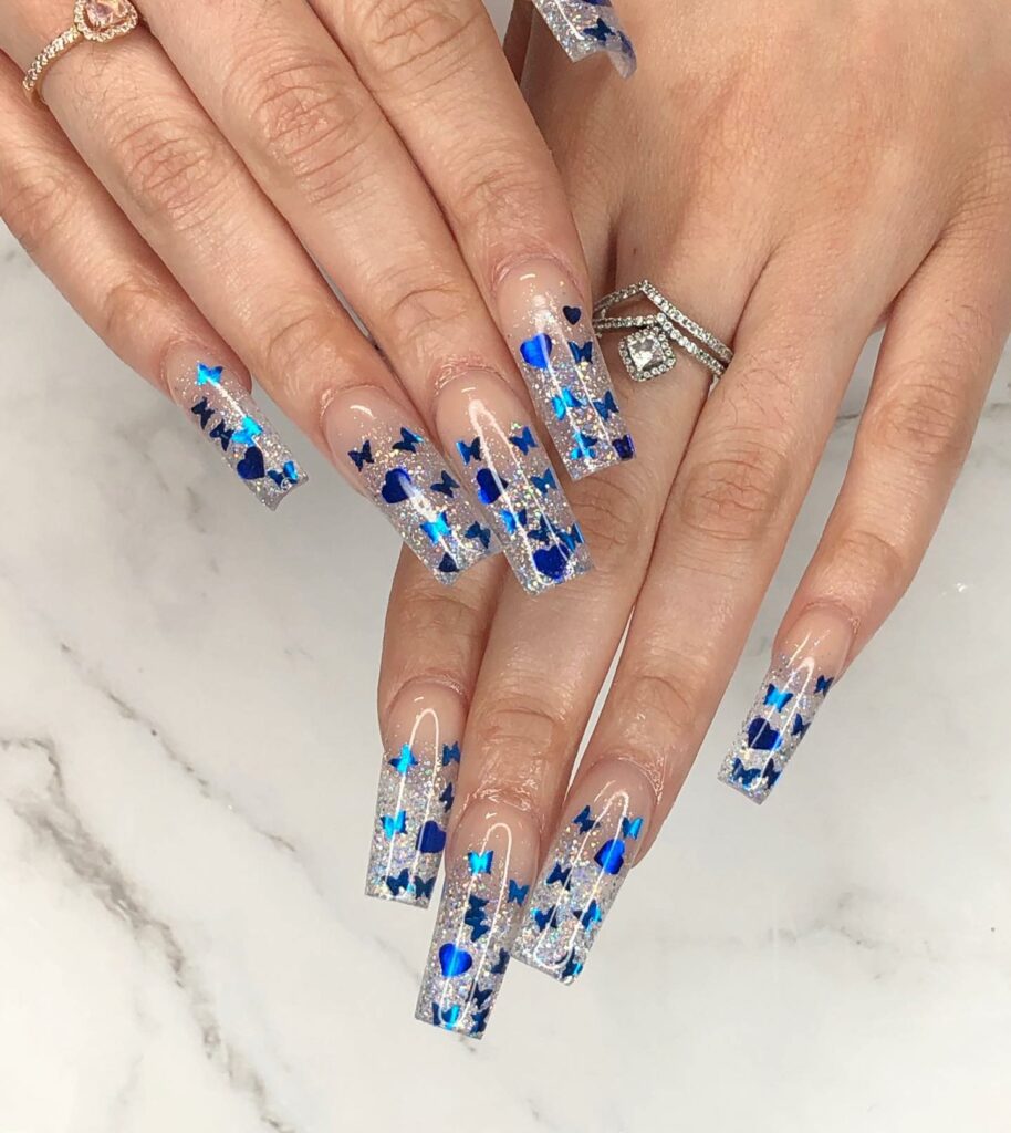 50 Latest Butterfly Nail Designs To try In 2024! 34 Clear Glitter Blue Butterfly Nails