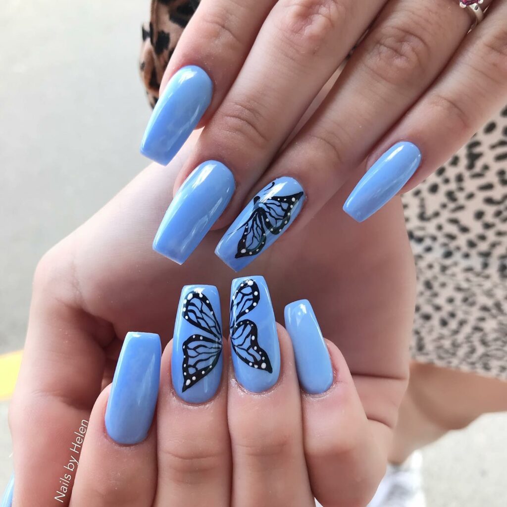 50 Latest Butterfly Nail Designs To try In 2024! 35 Blue Nails with Butterfly Accents