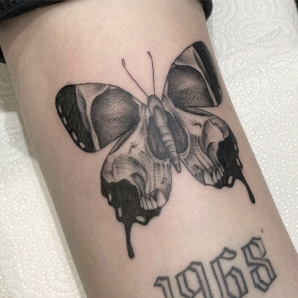 11+ Butterfly With Skull Tattoo Ideas That Will Blow Your Mind! 12 Butterfly With Skull And Numerals Tattoo