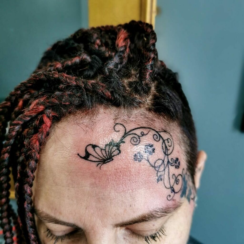 11+ Butterfly Face Tattoo Ideas That Will Blow Your Mind! 12 Butterfly and Vine Tattoo