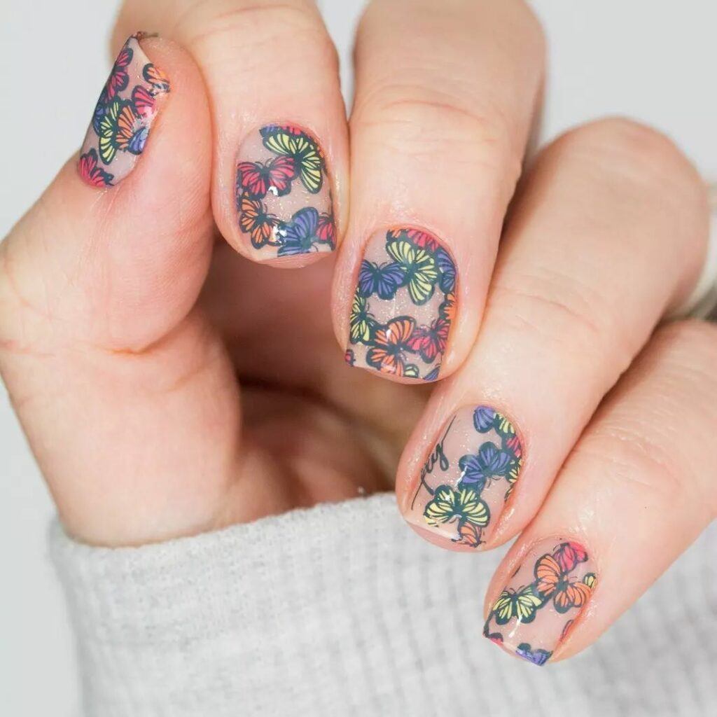 Butterfly design long rounded square nails