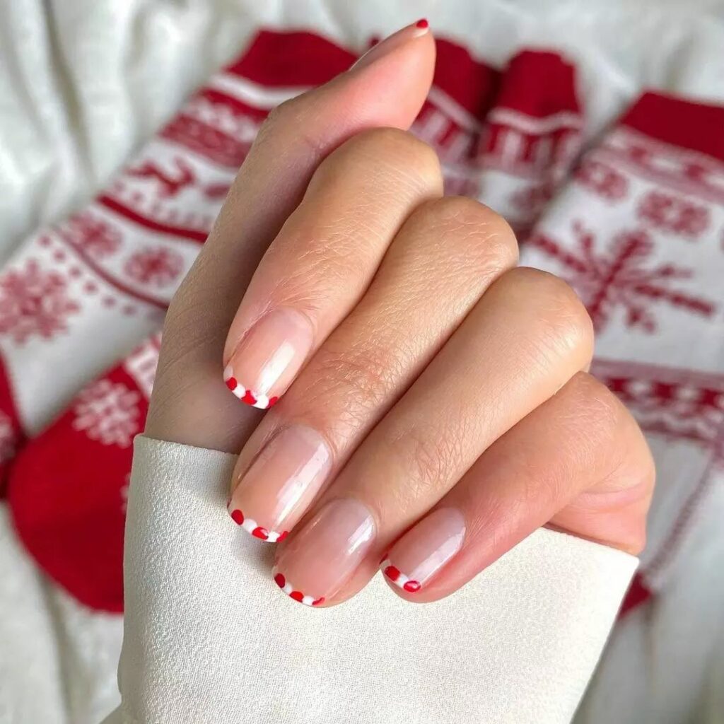Celebrate with 33 Short Christmas Nail Ideas in 2024 36 Candy Cane French Short Christmas Nails"