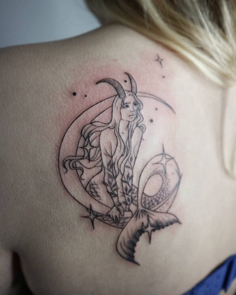 10+ Capricorn Tattoos For Females That Will Blow Your Mind! 14 Capricorn Goddess Mermaid Tattoo On Back