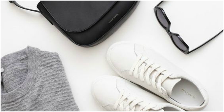 How to Create the Perfect Capsule Wardrobe 16 Grey jumper, black handbag, white trainers and black sunglasses