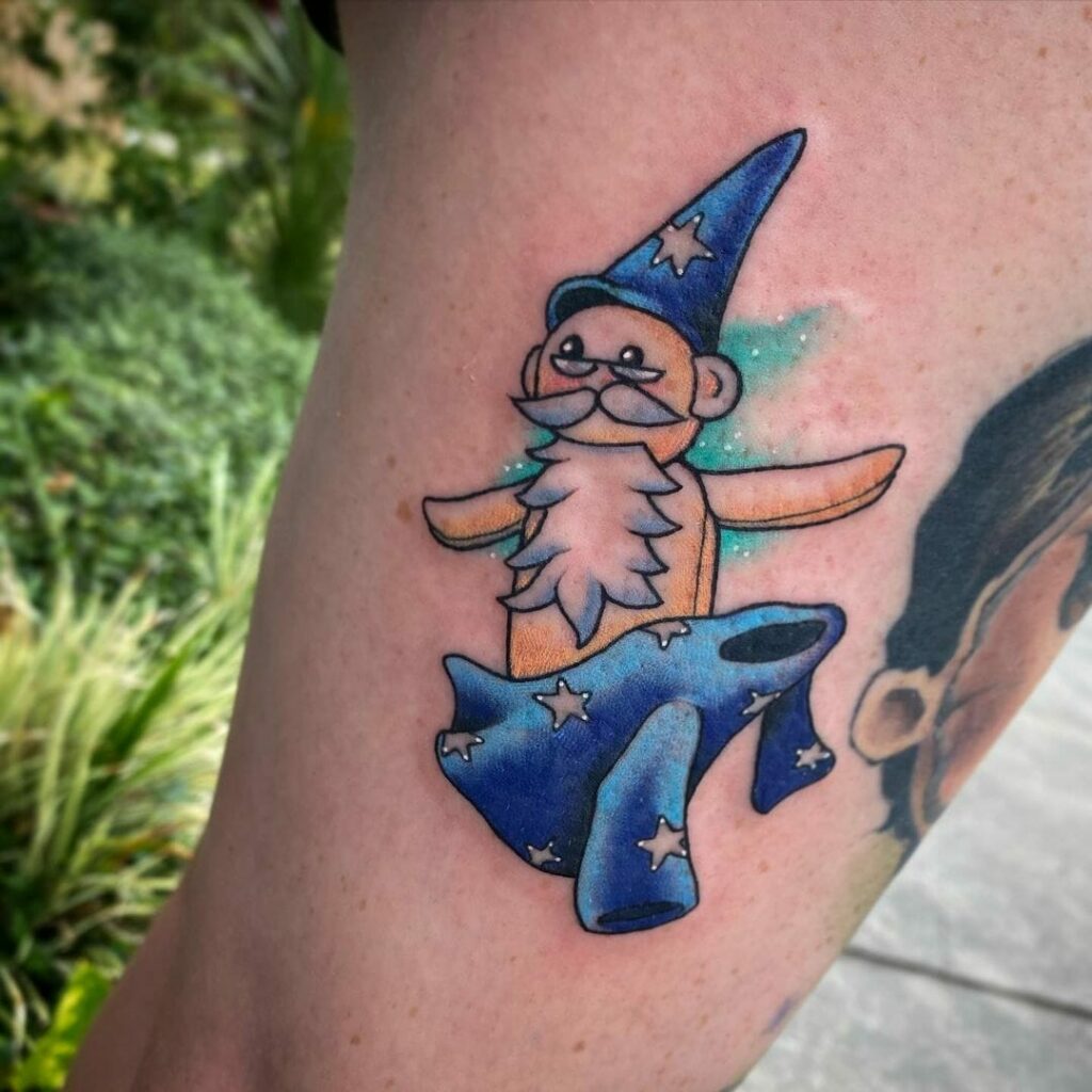 11+ Dumbledore Tattoo Ideas You'll Have To See To Believe! 14 Cartoon Themed Miniature Dumbledore Tattoo