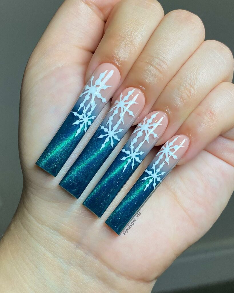 Feel Festive with 30 Blue Christmas Nail Ideas in 2024 29 Cat Eye Blue Christmas Nails