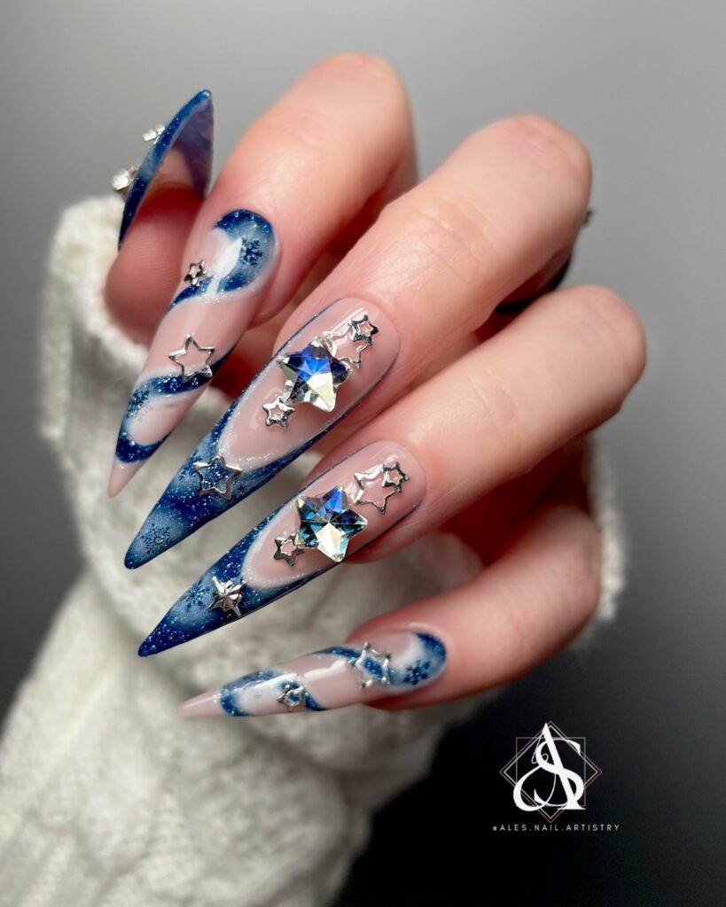 Get Festive with 20 Stiletto Christmas Nail Ideas in 2024 21 Celestial Blue Stiletto Christmas Nails