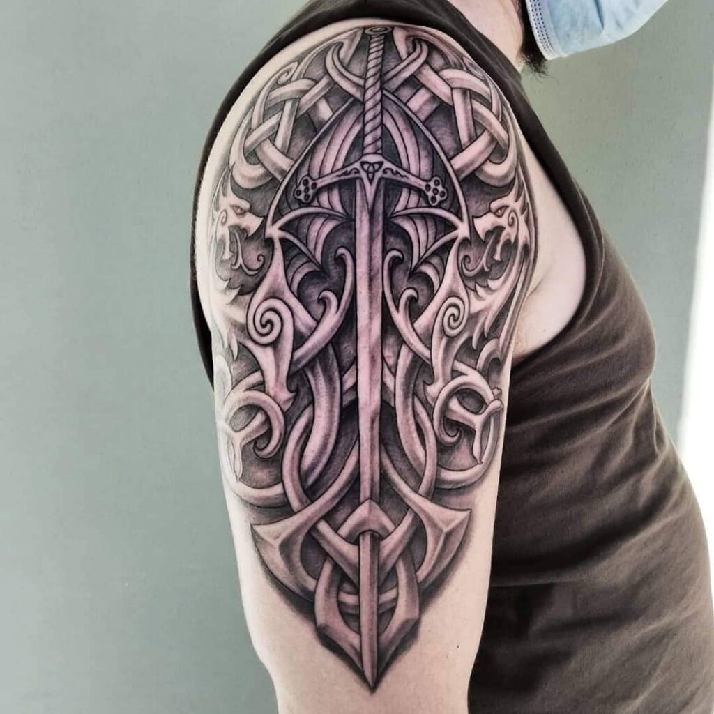 11+ Celtic Sword Tattoo Ideas That Will Blow Your Mind! 13 Celtic Sword Tattoo Design Representing Courage
