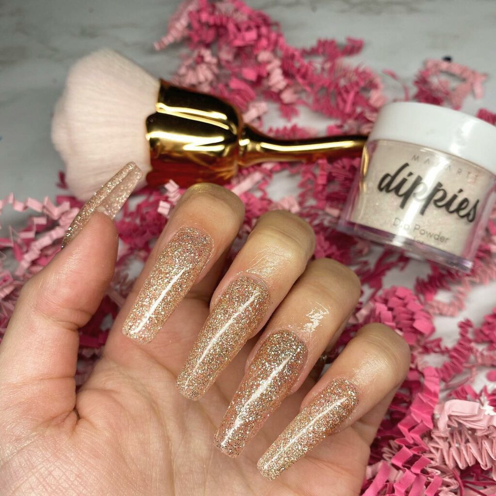 Discover the Hottest Designs of 2024: 30 Latest Dip Powder Nails 32 Champagne Glitter Dip Powder Nails