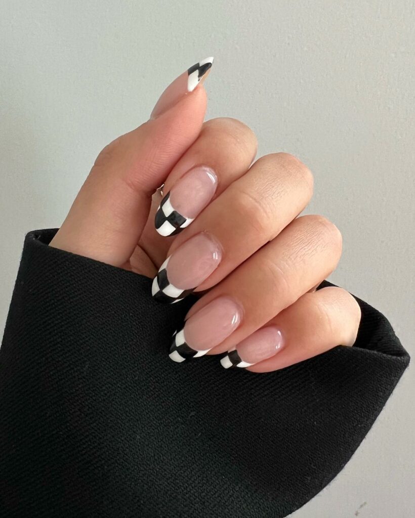 Discover 44 Trendsetting Black Nail Designs for 2024 16 Checker Print Black nails