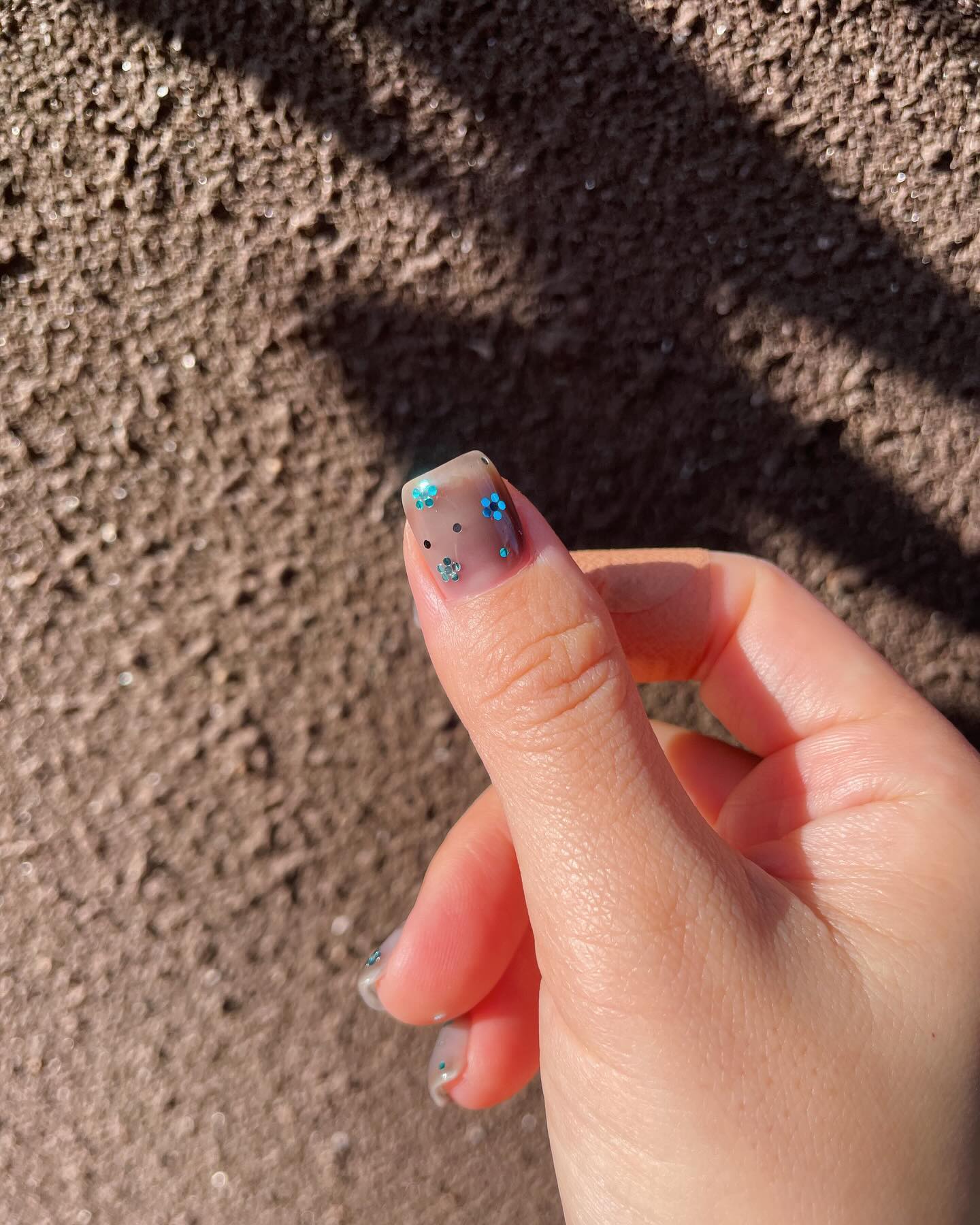 30 Stunning Blue Nail Designs To Try Today ✨ 22 Chic Clear Nails with Blue Glitter Flowers