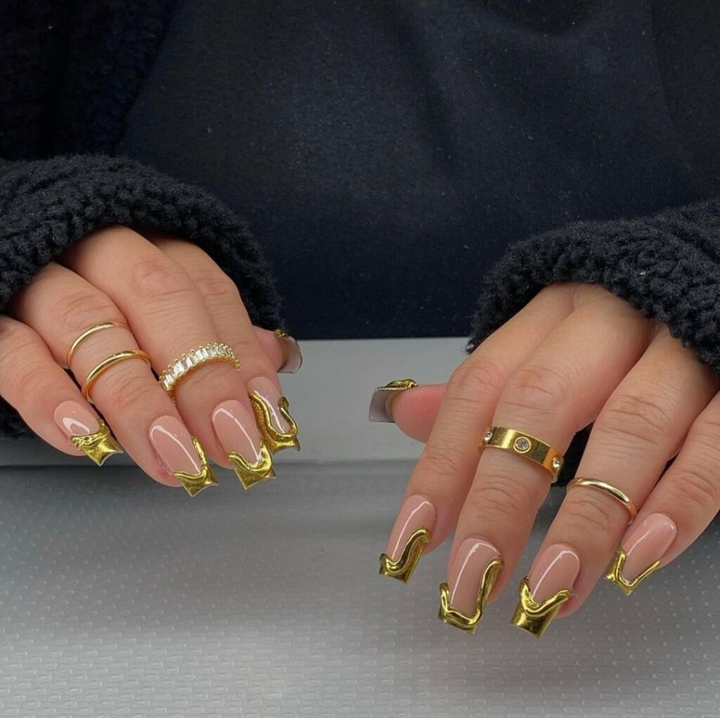 55 Latest Gold French Tip Nail Ideas To Try In 2024! 26 Chrome Swirl Gold French Nails