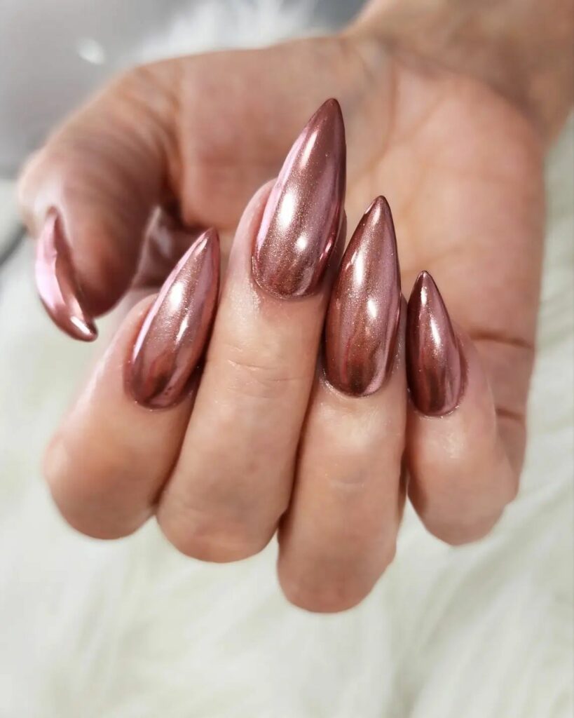Shine Bright with 50 Rose Gold Nail Designs for 2024 14 Chrome rose gold nails