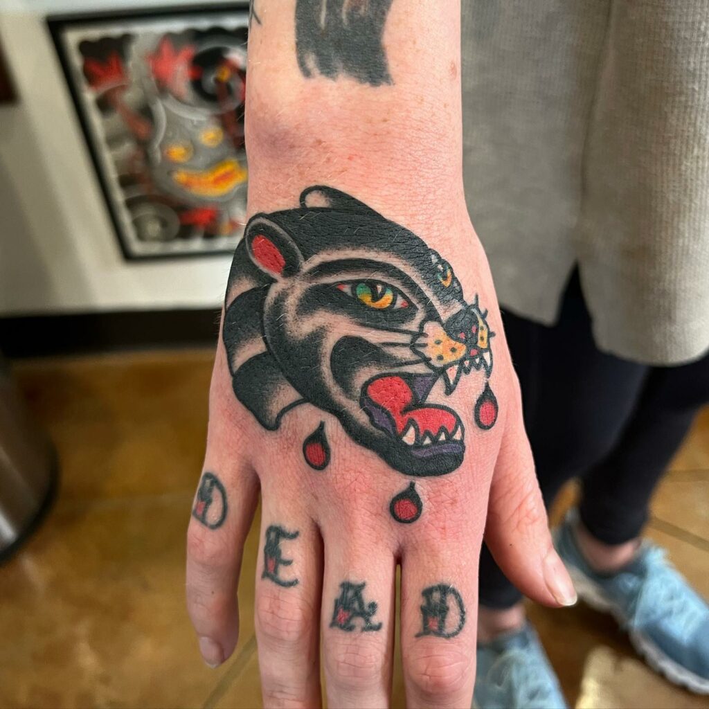 10+ Traditional Panther Head Tattoo That Will Blow Your Mind! 13 Classic Hand Panther Head Traditional Tattoo Design