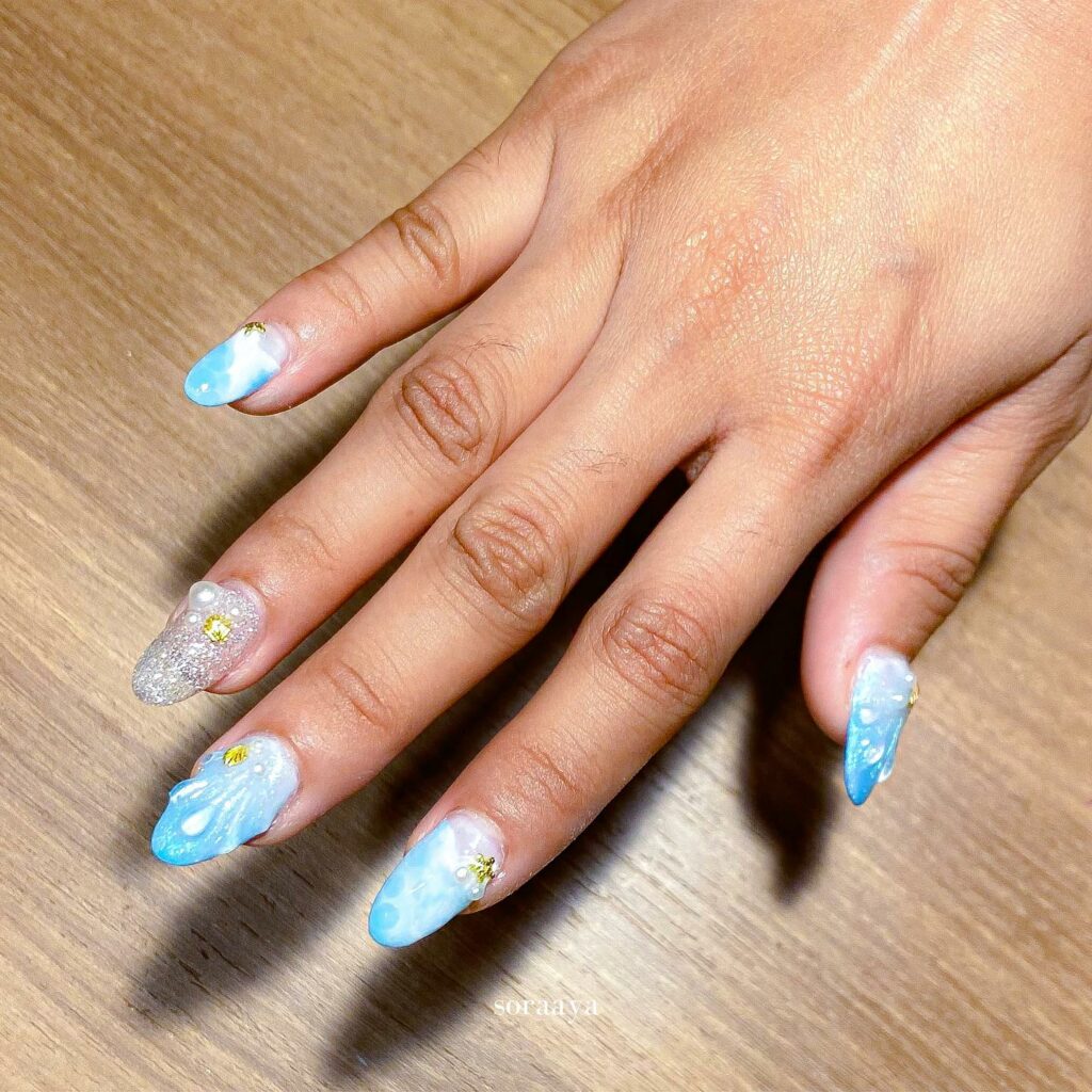 Experiment with 30 Stunning Blue Ombré Nails for 2024 15 Clouds blue ombre nails