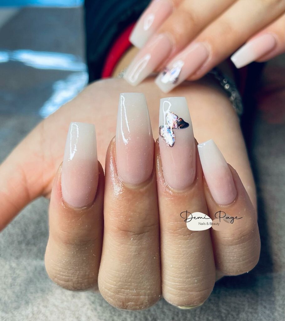 2024's Latest Pink Ombre Nails: 29 Designs to Try 19 Coffin Pink Ombre Nails with Butterfly Design
