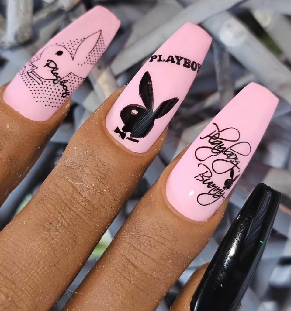 28 Stunning Playboy Nail Designs for 2024 21 Coffin-Shaped Pink Playboy Nail Elegance