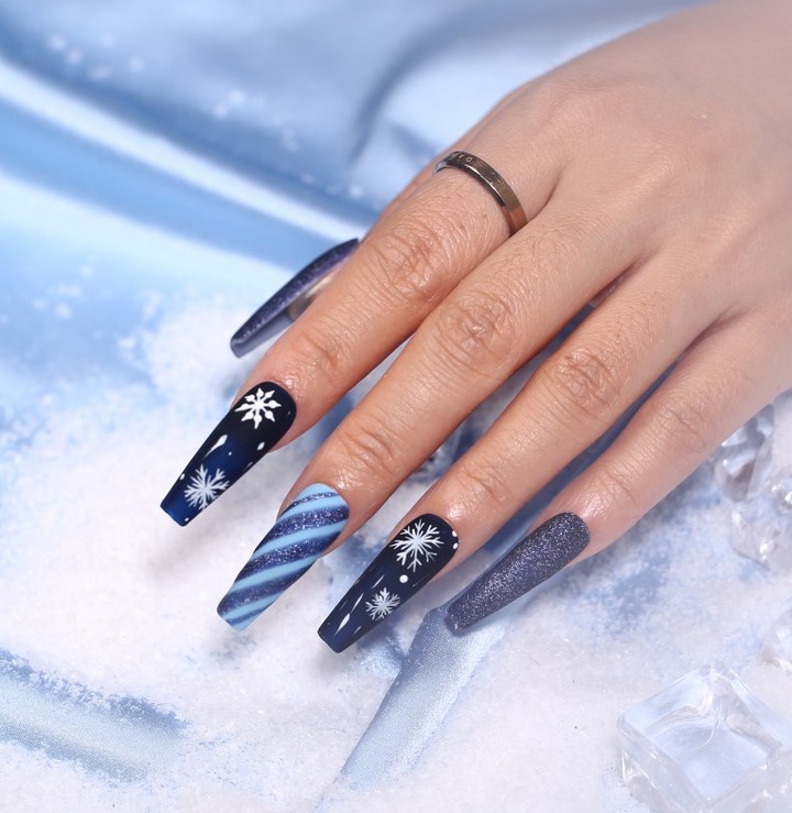 Feel Festive with 30 Blue Christmas Nail Ideas in 2024 41 Modern Edge Snowflake-Adorned Coffin Nails