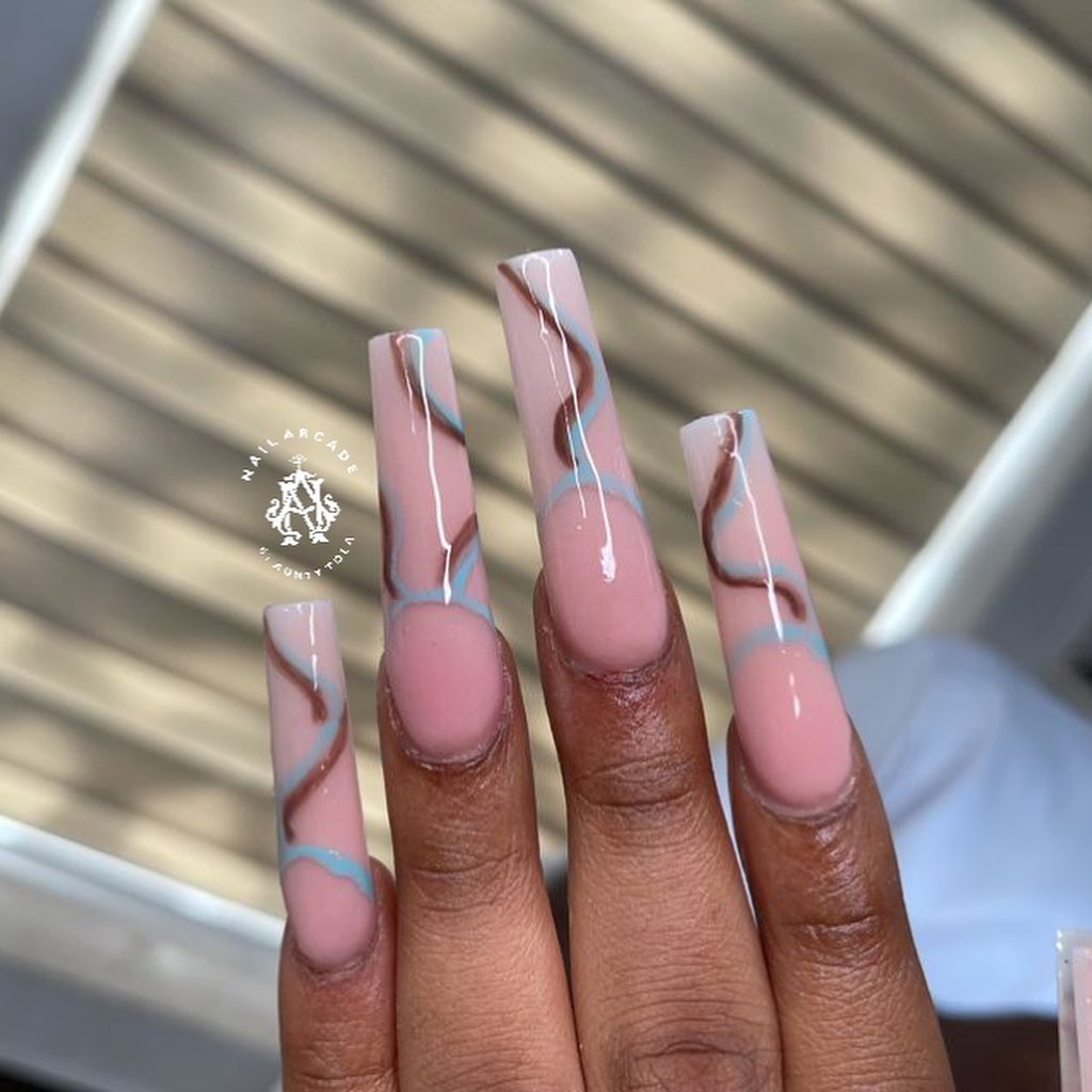 40 Latest Nude Pink Nail Ideas To Try In 2024! 35 Coffin Swirl Nude Pink Nails