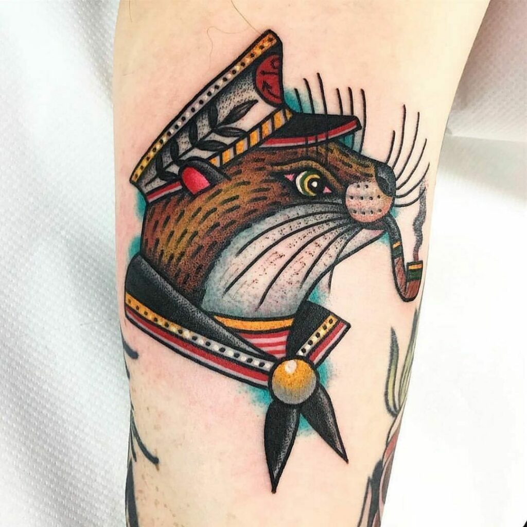 10+ Sea Otter Tattoo Ideas That Will Blow Your Mind! 14 Colorful Captain Otter Tattoo