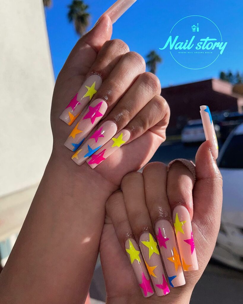 40 Latest Nude Pink Nail Ideas To Try In 2024! 39 Colorful Star Accents on Nude Pink Nails