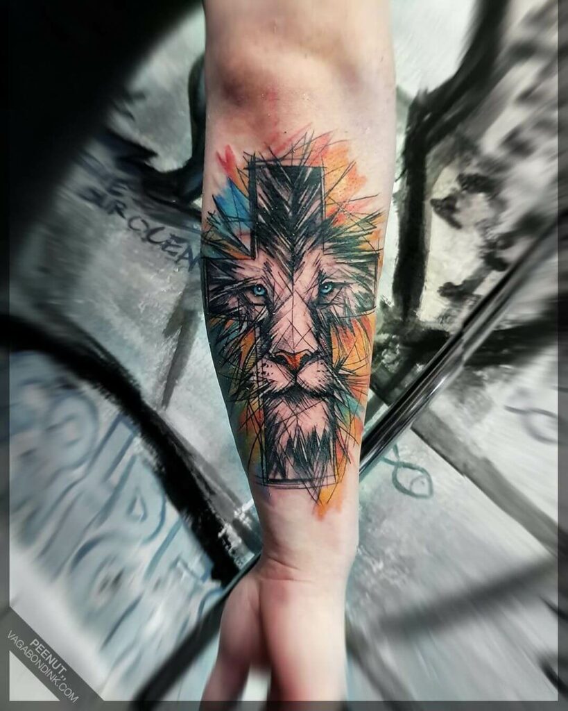 11+ Lion And Cross Tattoo Ideas That Will Blow Your Mind! 15 Coloured Lion Cross Tattoo
